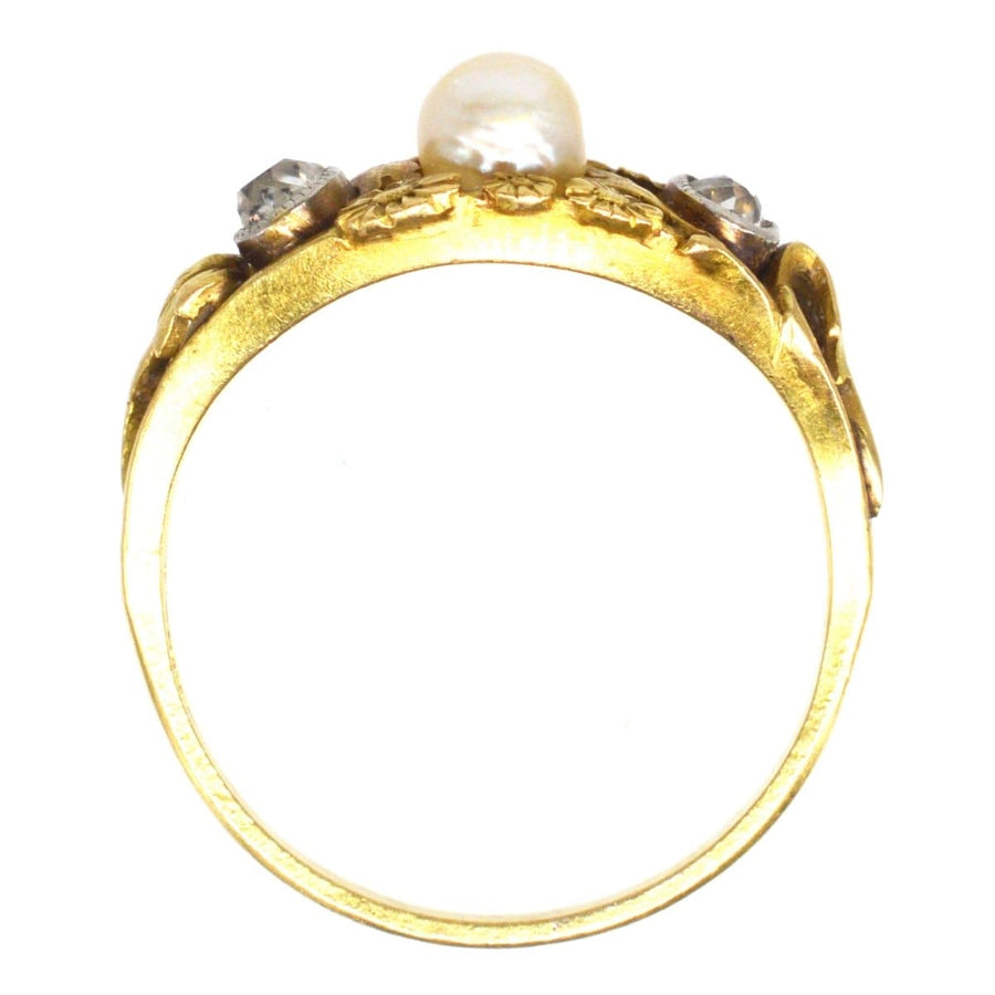 Art Nouveau 18ct gold ring featuring a natural pearl and old mine cut diamonds, perfect for antique jewellery collectors.