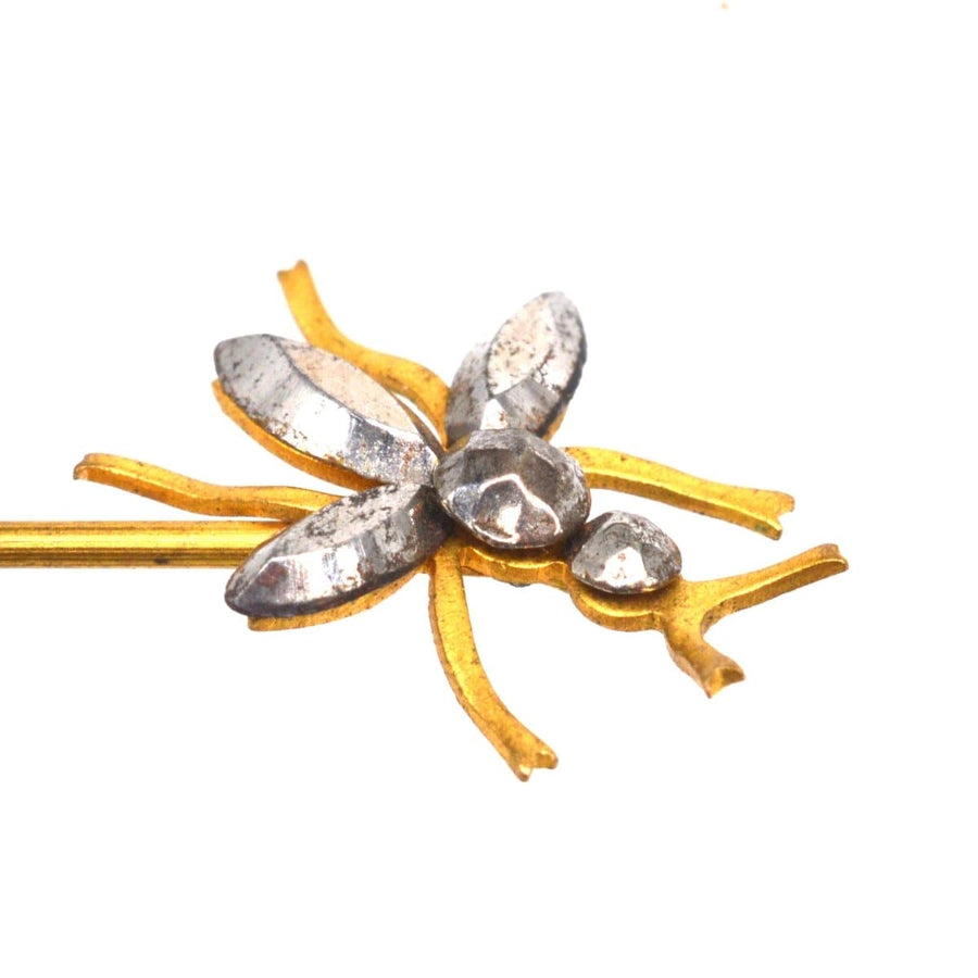 Victorian cut steel insect tie pin featuring polished steel and gold accents, resembling a delicate insect design.
