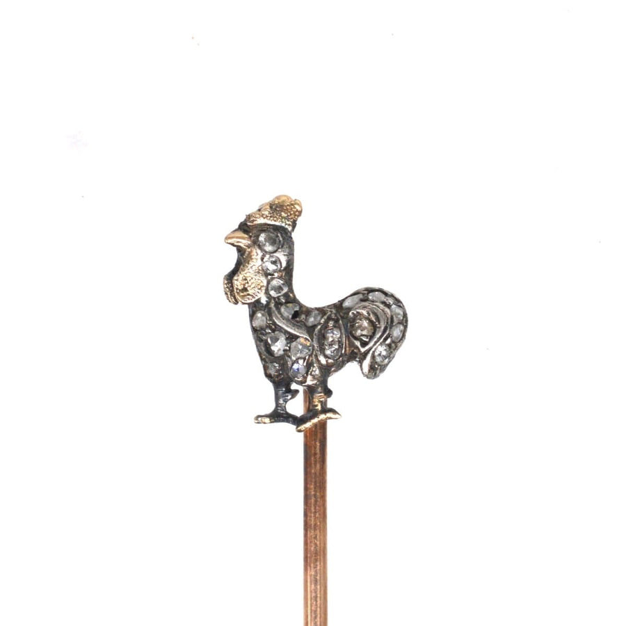 Victorian silver diamond cockerel tie pin featuring rose diamonds, symbolizing bravery and prosperity.