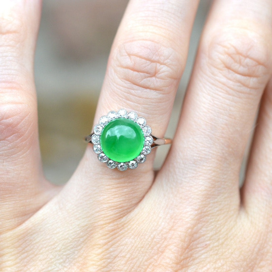Art Deco 18ct gold ring featuring cert. Grade A jadeite 'Imperial Jade' cabochon and diamond cluster.