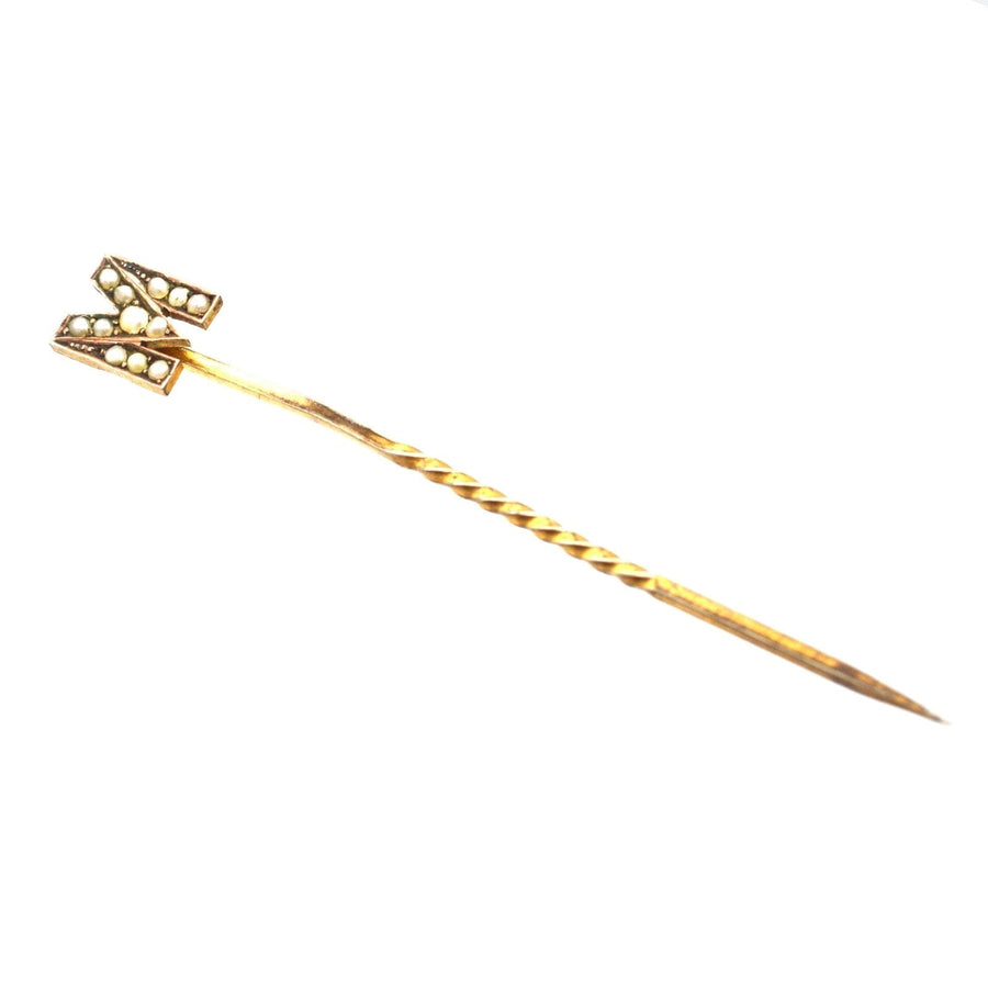 Edwardian 15ct gold stick pin featuring seed pearls in the shape of letter 'M', ideal for stylish ties.