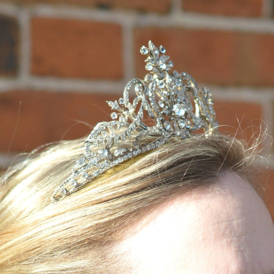 Victorian silver paste tiara featuring floral sprays and intricate swags, elegantly worn on hair.