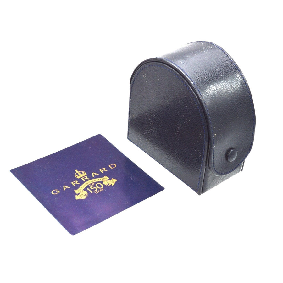 Garrard 150th anniversary travel alarm clock box and authenticity card in original black leather case.